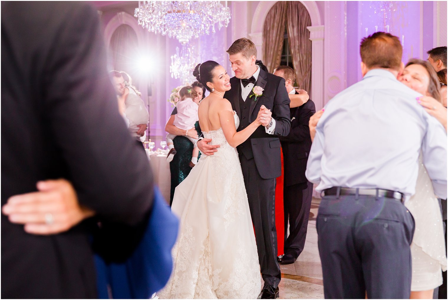 bride and groom dancing at wedding reception 