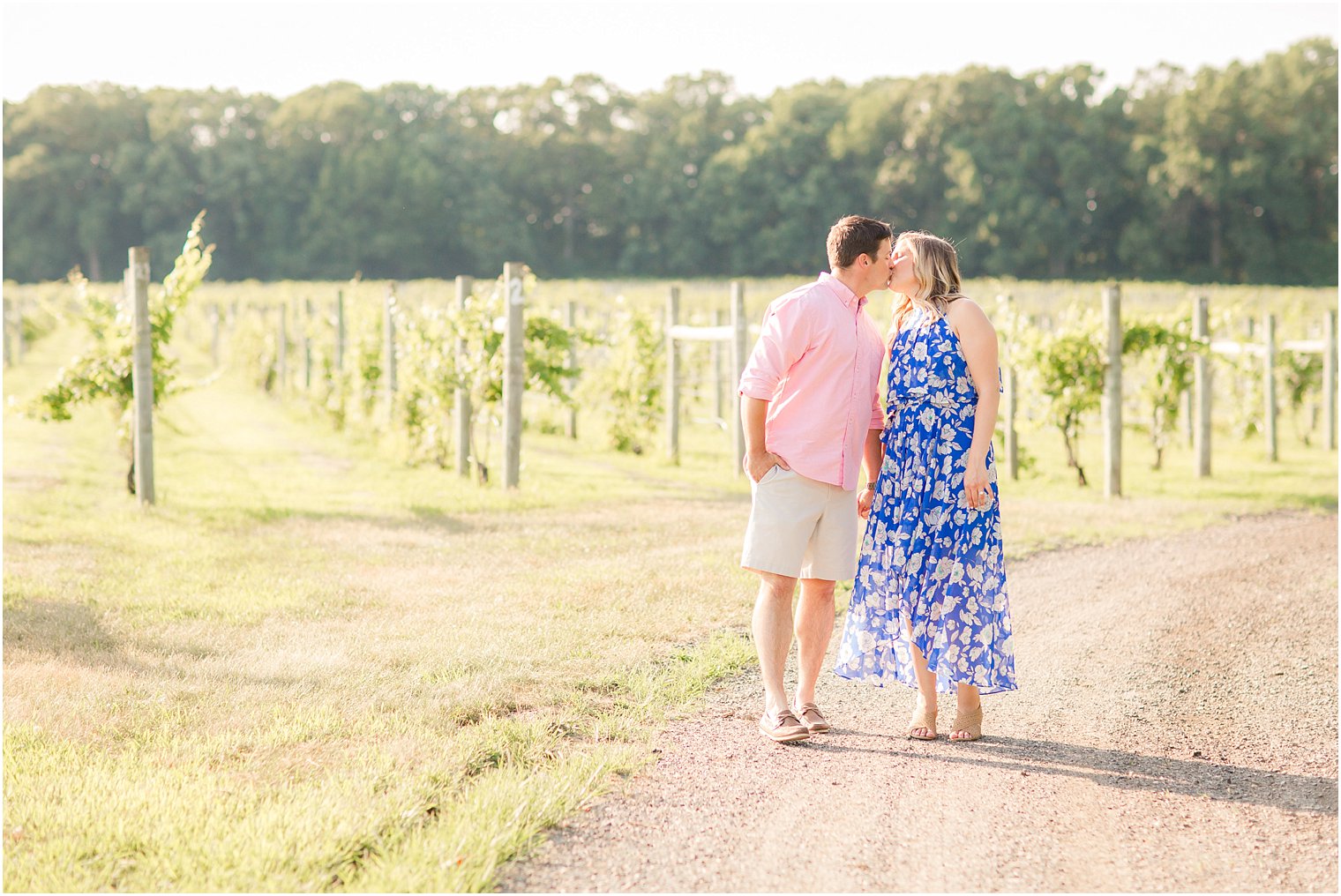 bride and groom to-be kiss during engagement session at Laurita Winery