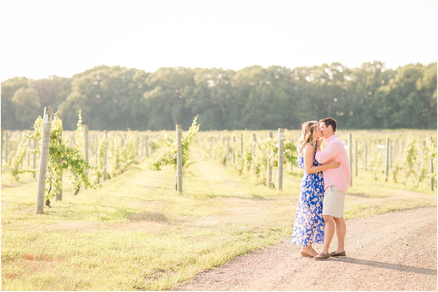 Bride and groom to be kiss at Laurita Winery in New Egypt NJ