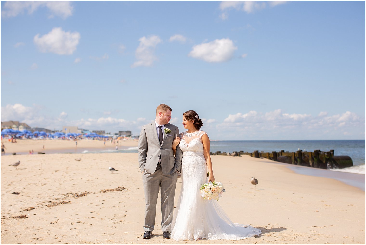 bride and groom wedding portrait on beach at Ocean Place Resort and Spa photographed by Idalia Photography