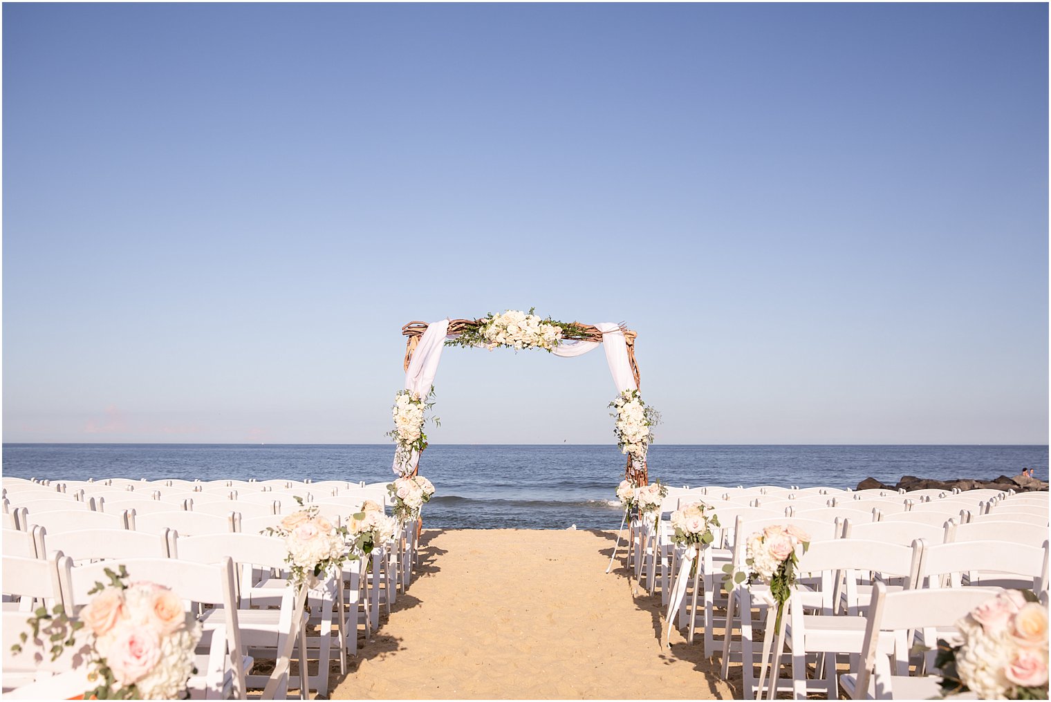 oceanfront beach wedding ceremony at Ocean Place Resort and Spa