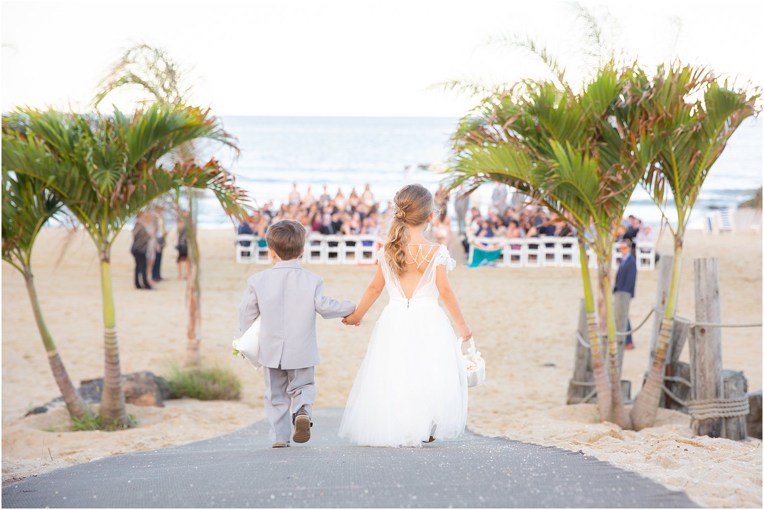 flower girl and ring bearer enter ceremony at Ocean Place Resort and Spa