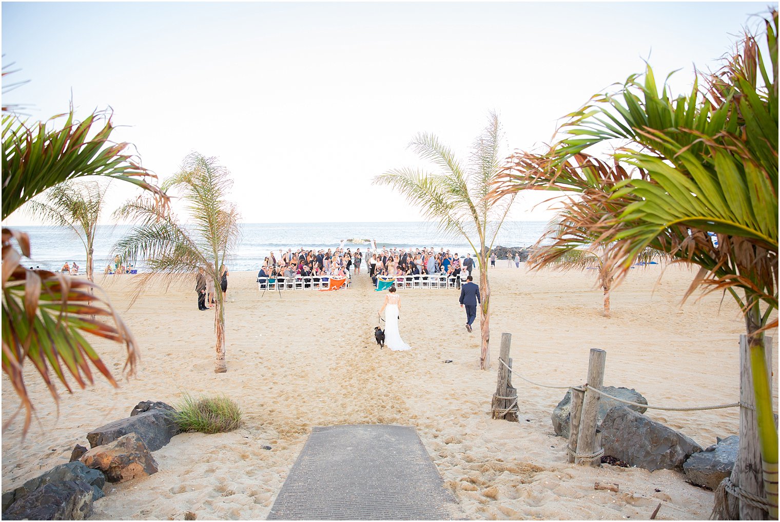 Outdoor wedding ceremony on beach at Ocean Place Resort and Spa