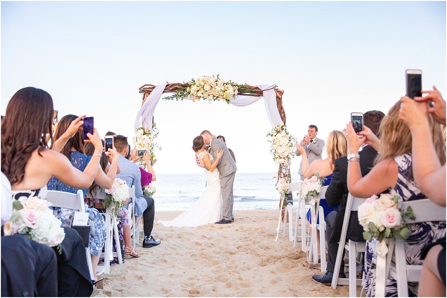 first kiss as husband and wife at Ocean Place Resort and Spa