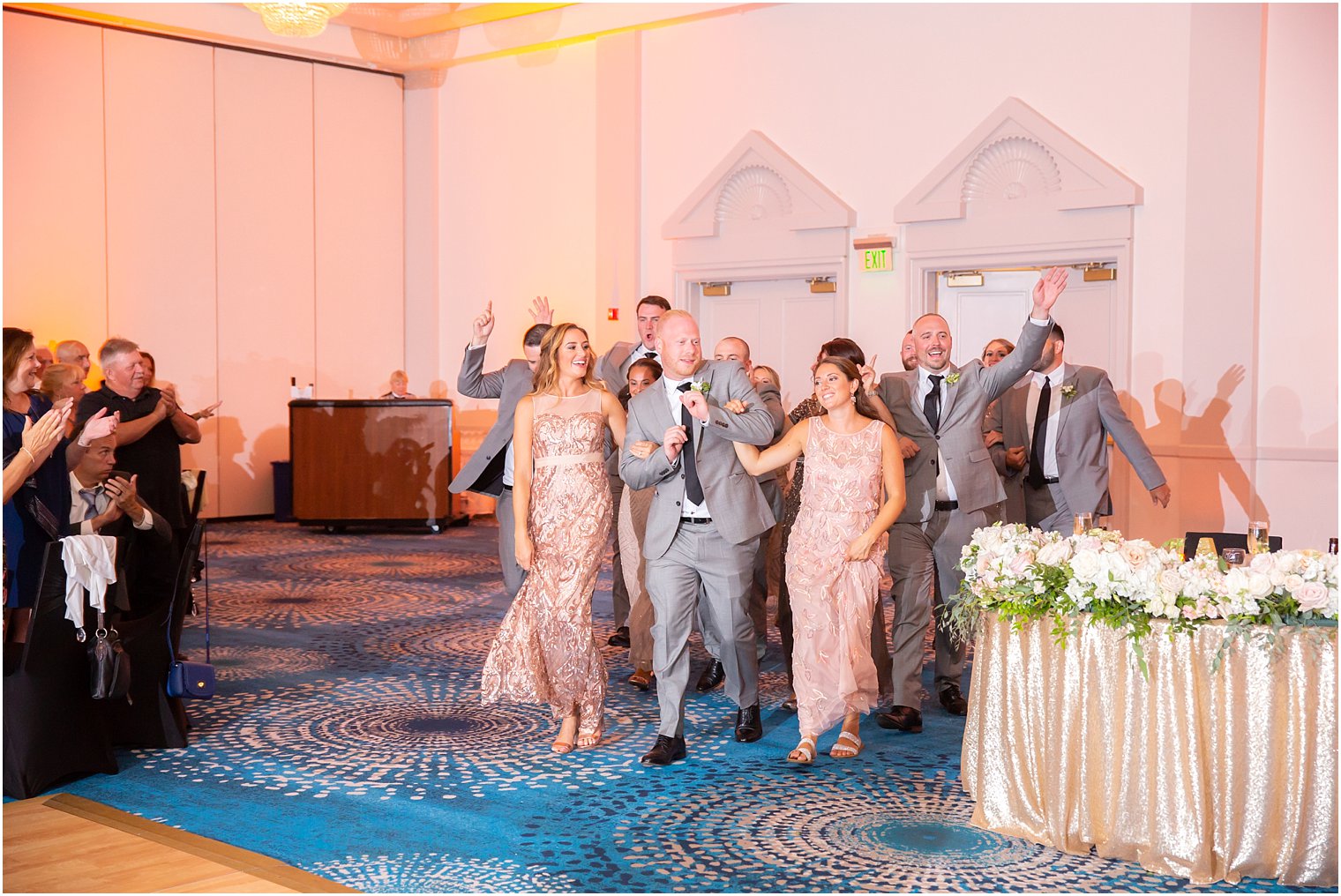 bridal party enters ballroom for reception at Ocean Place Resort and Spa