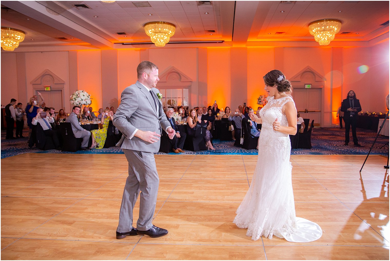 bride dancing with groom during wedding reception at Ocean Place Resort and Spa
