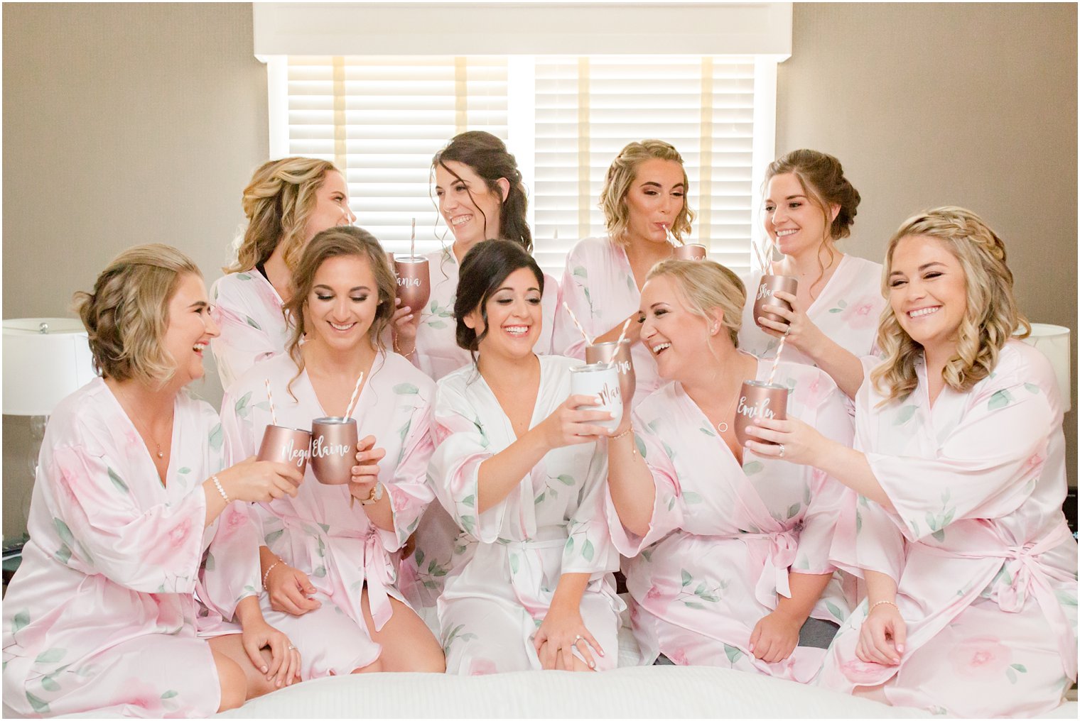 bridesmaids and bride getting ready in floral robes for Park Savoy Estate wedding