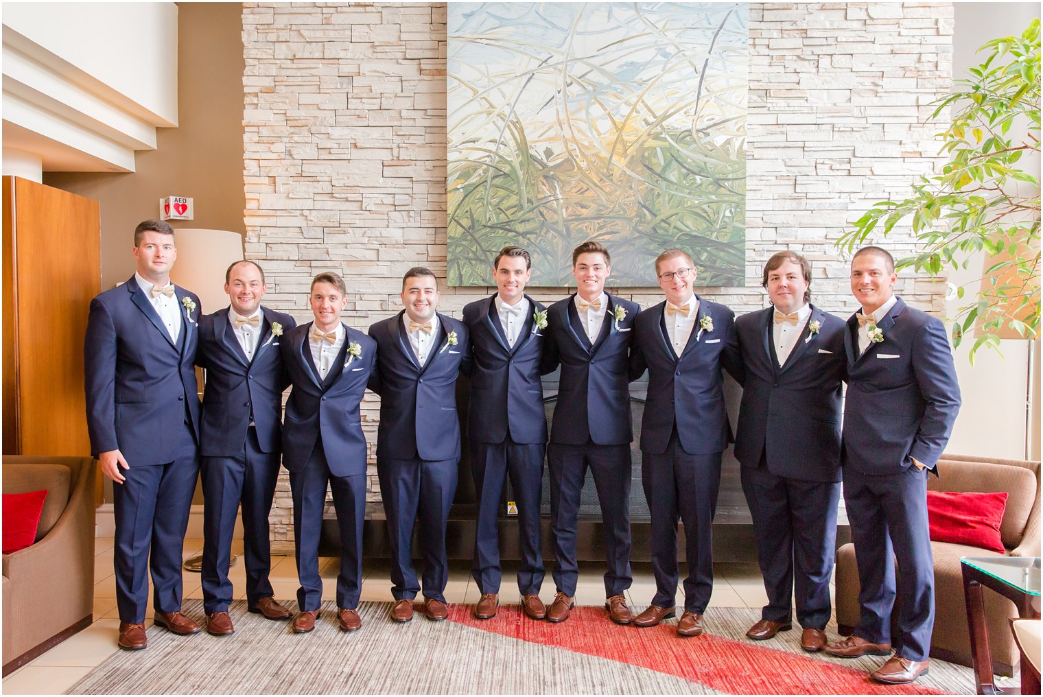 Groom with groomsmen in navy suits before Park Savoy Estate wedding day