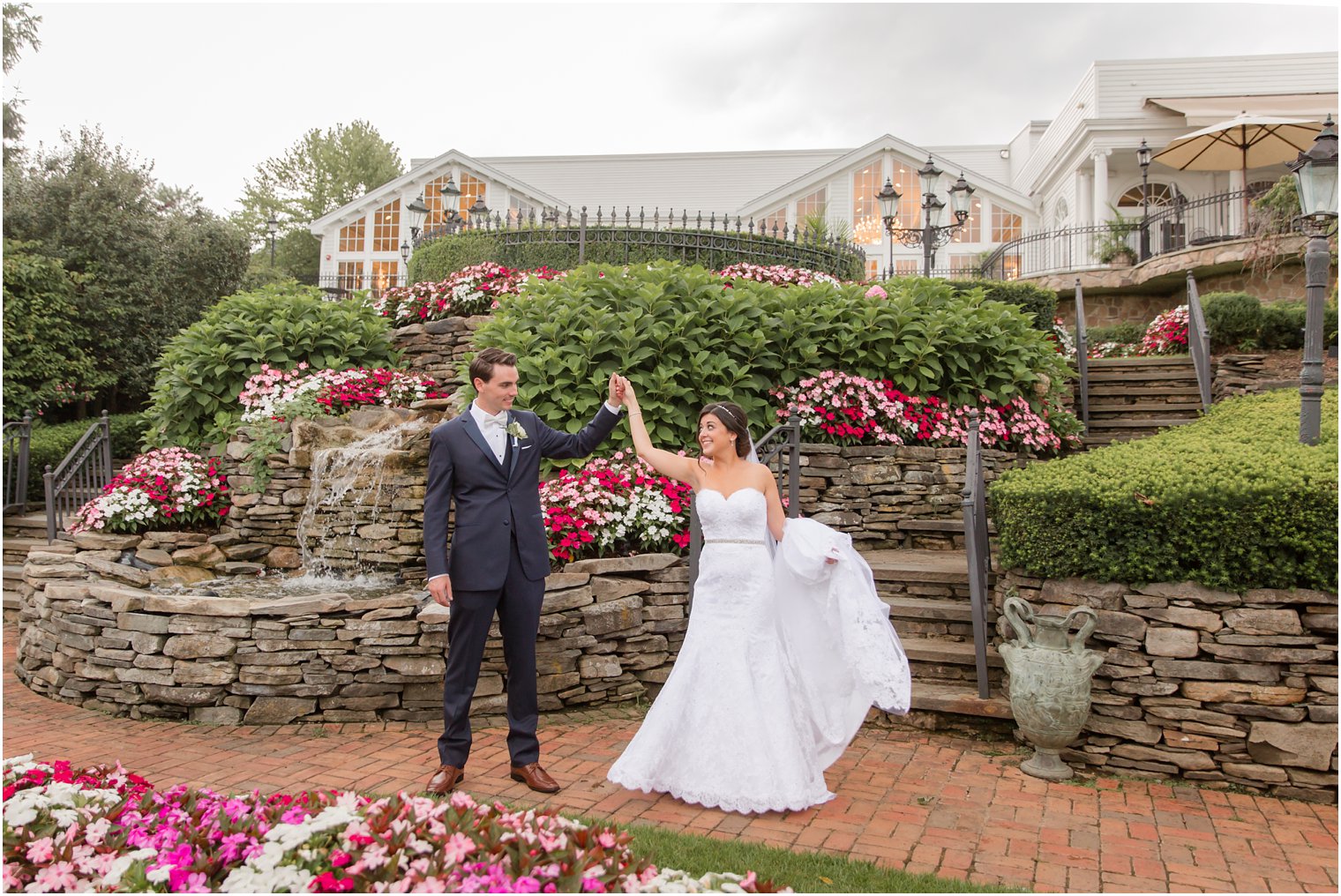 bride and groom dancing in gardens at Park Savoy Estate 