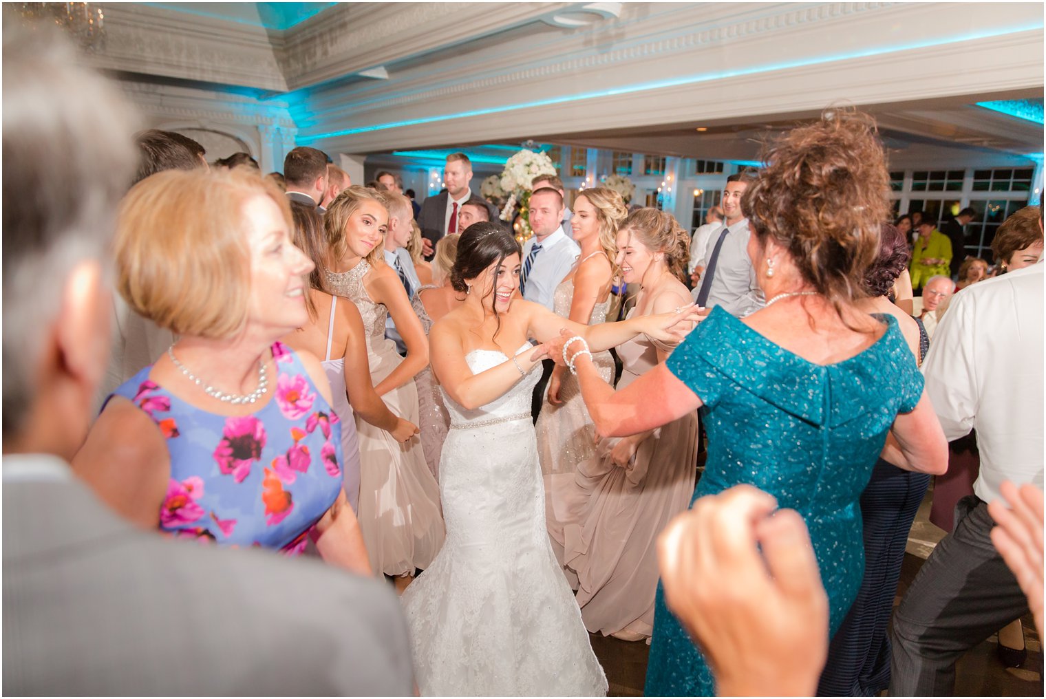 bride dances with family at Park Savoy Estate wedding reception