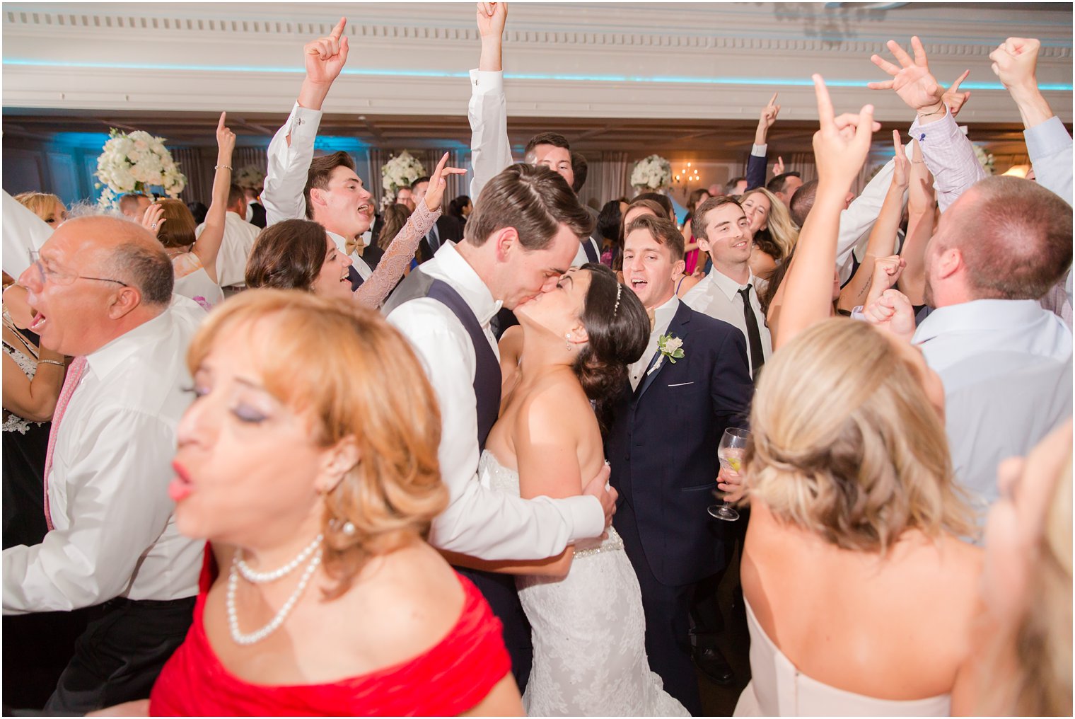 bride and groom kiss on dance floor during Park Savoy Estate wedding reception