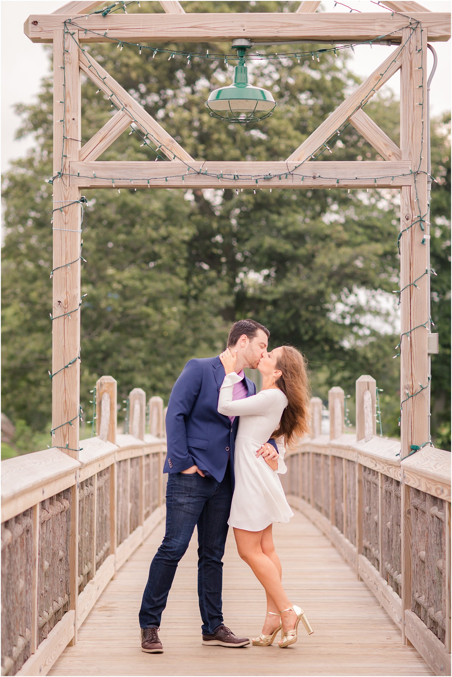 bride kisses groom on bride in Spring Lake NJ