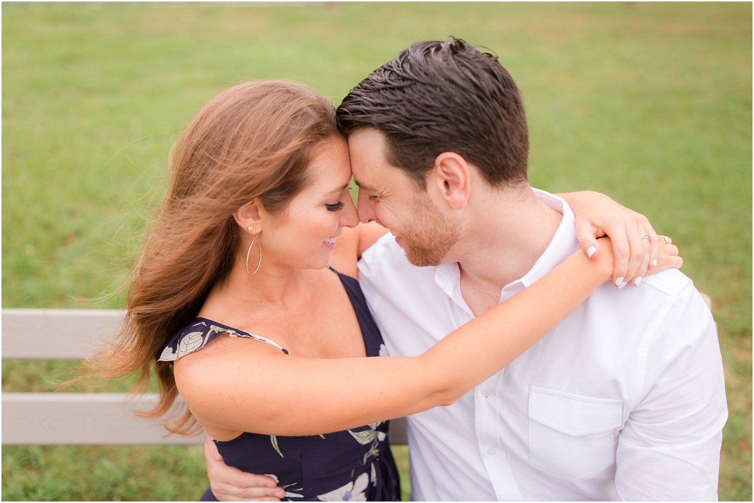 bride and groom cuddle Spring Lake NJ Engagement session