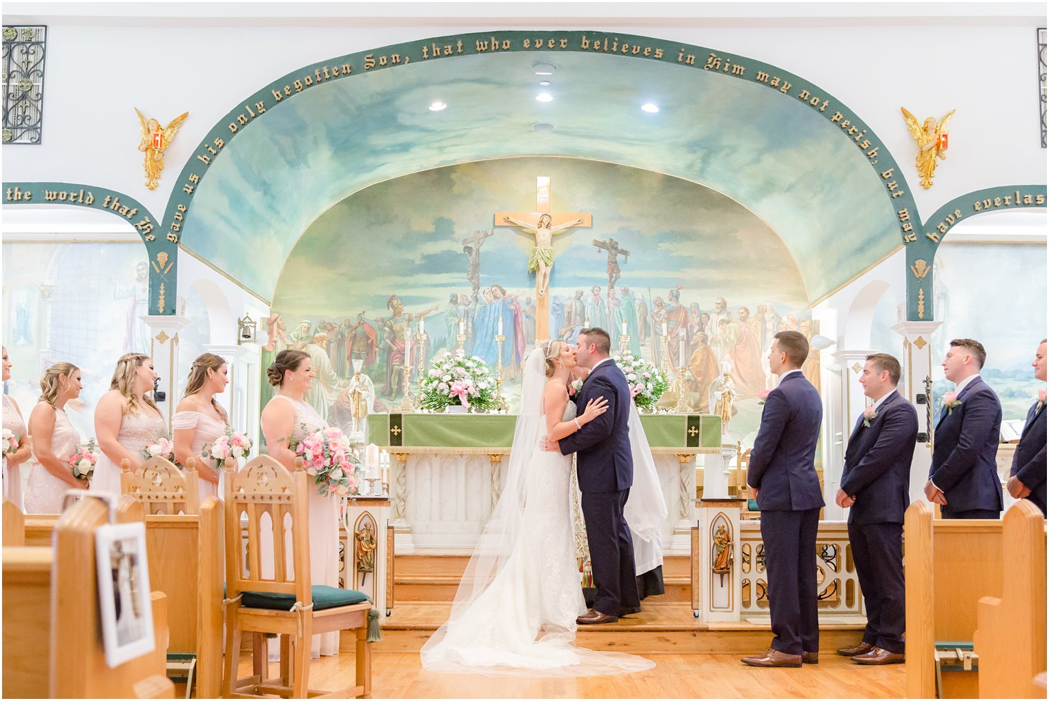 bride and groom first kiss during Somerset NJ wedding ceremony