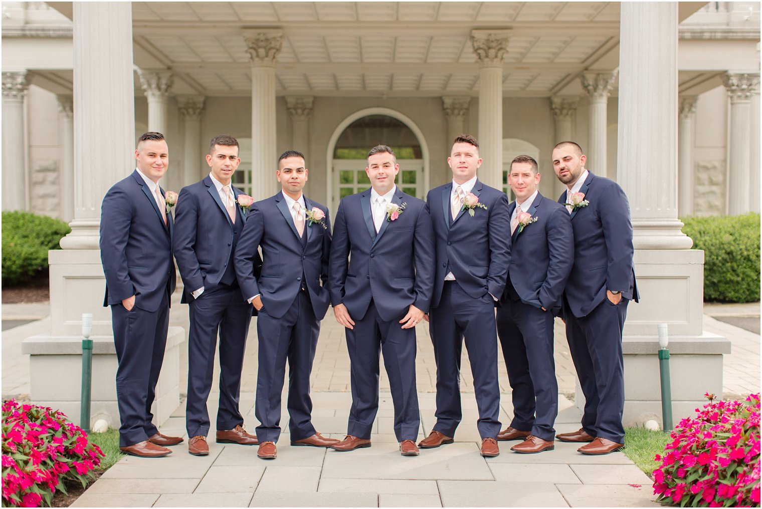 groom with groomsmen in navy suits at Palace at Somerset Park