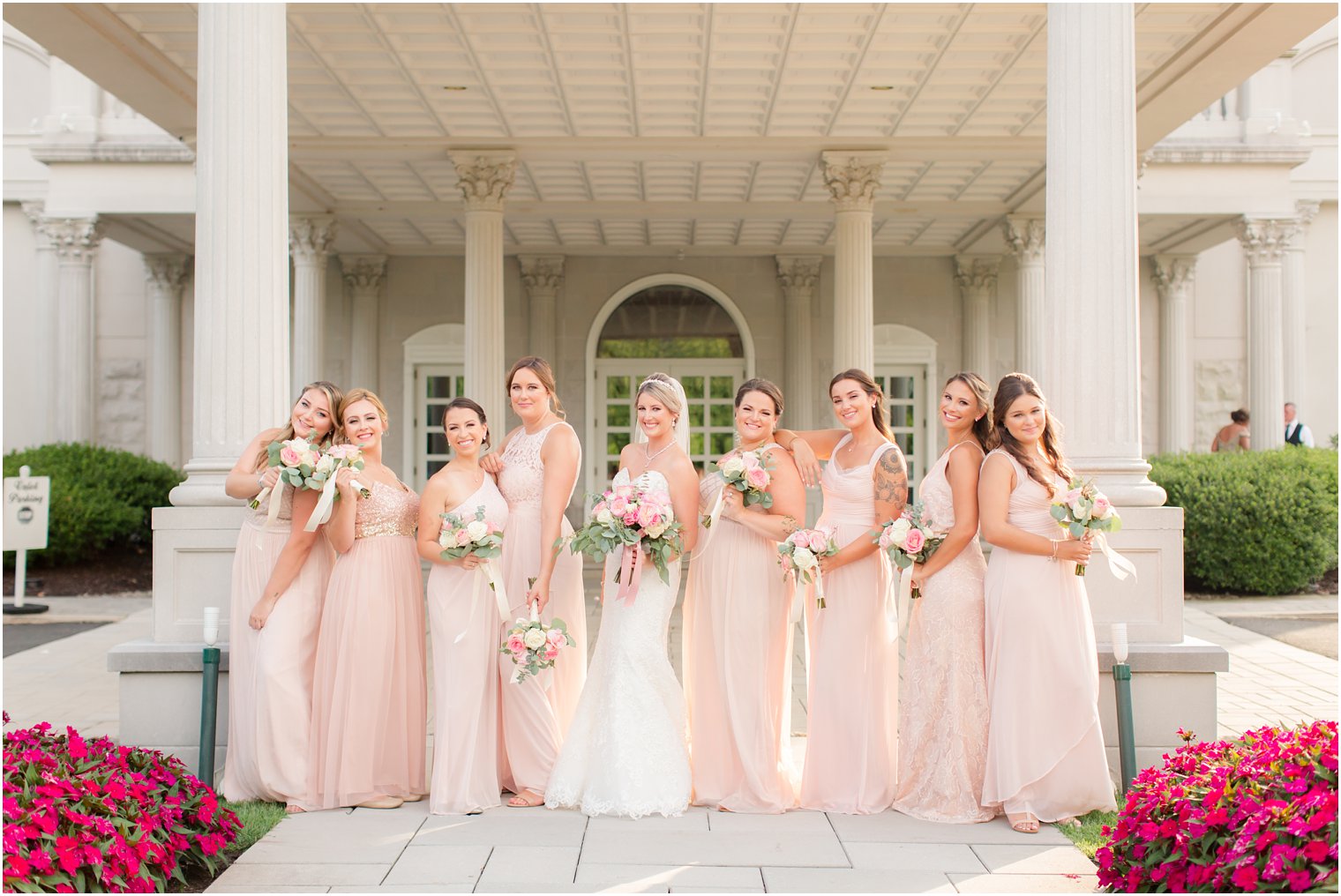 bridesmaids pose during wedding portraits at the Palace at Somerset Park in NJ