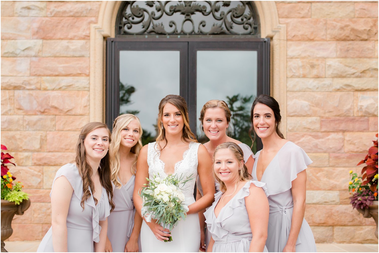 bride with bridesmaids in Joanna August bridesmaid gown at Jasna Polana