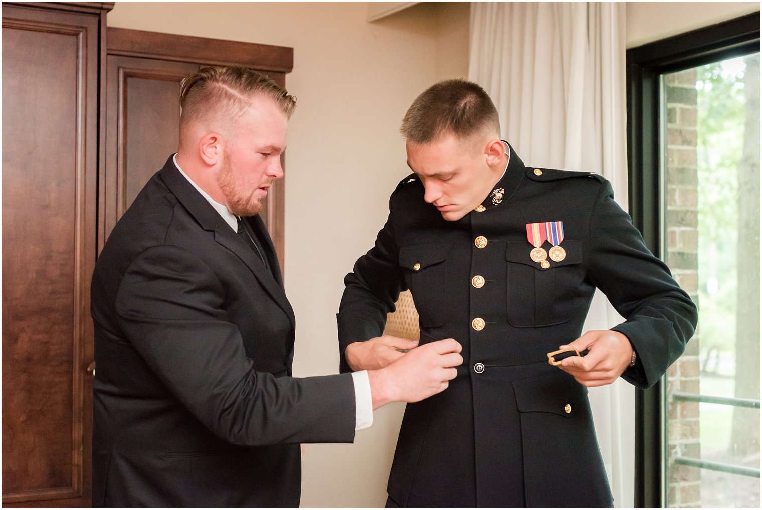 groomsman helps US Marine groom get ready for Jasna Polana wedding