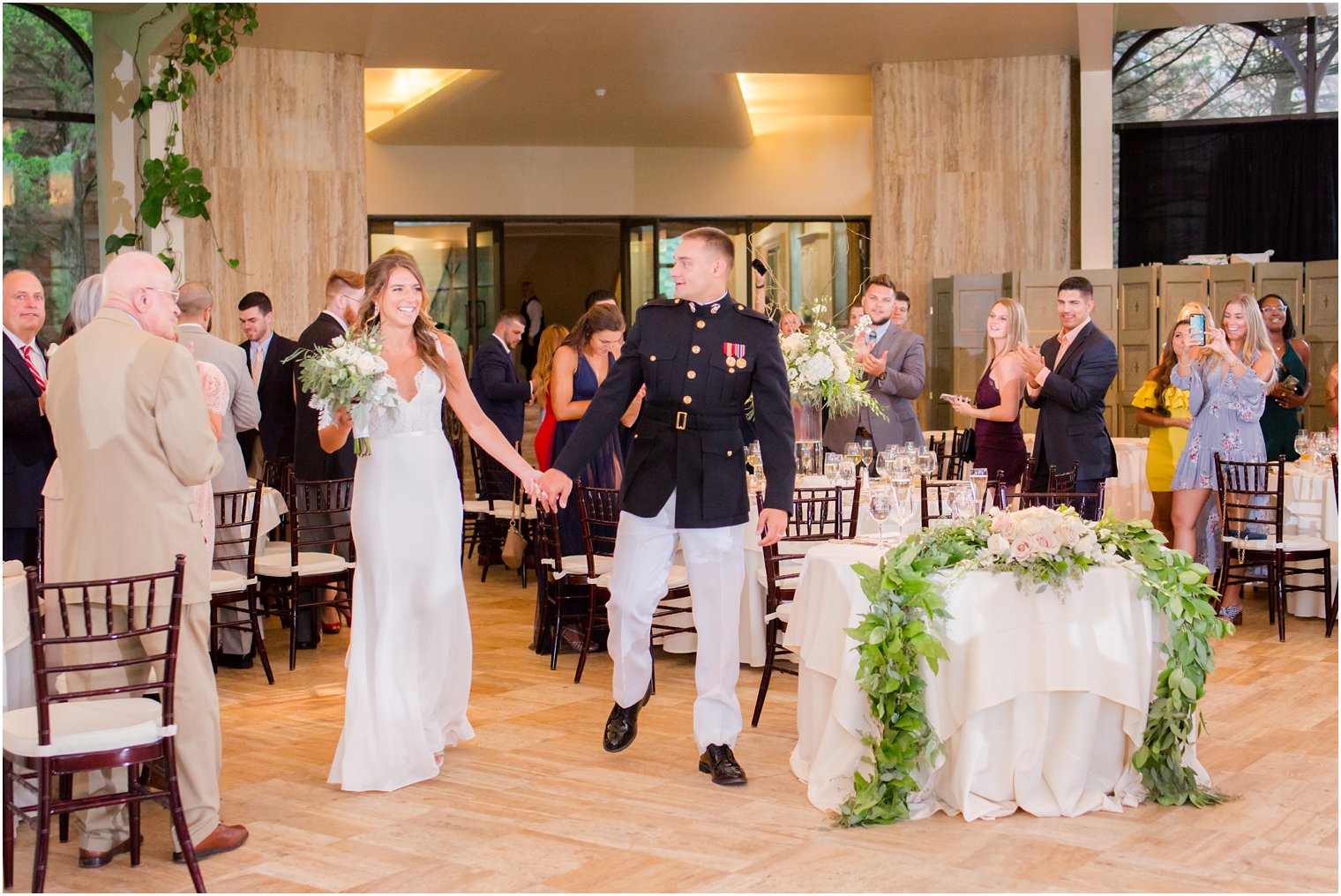 bride and groom enter reception at Jasna Polana photographed by Idalia Photography associate photographer Jocelyn