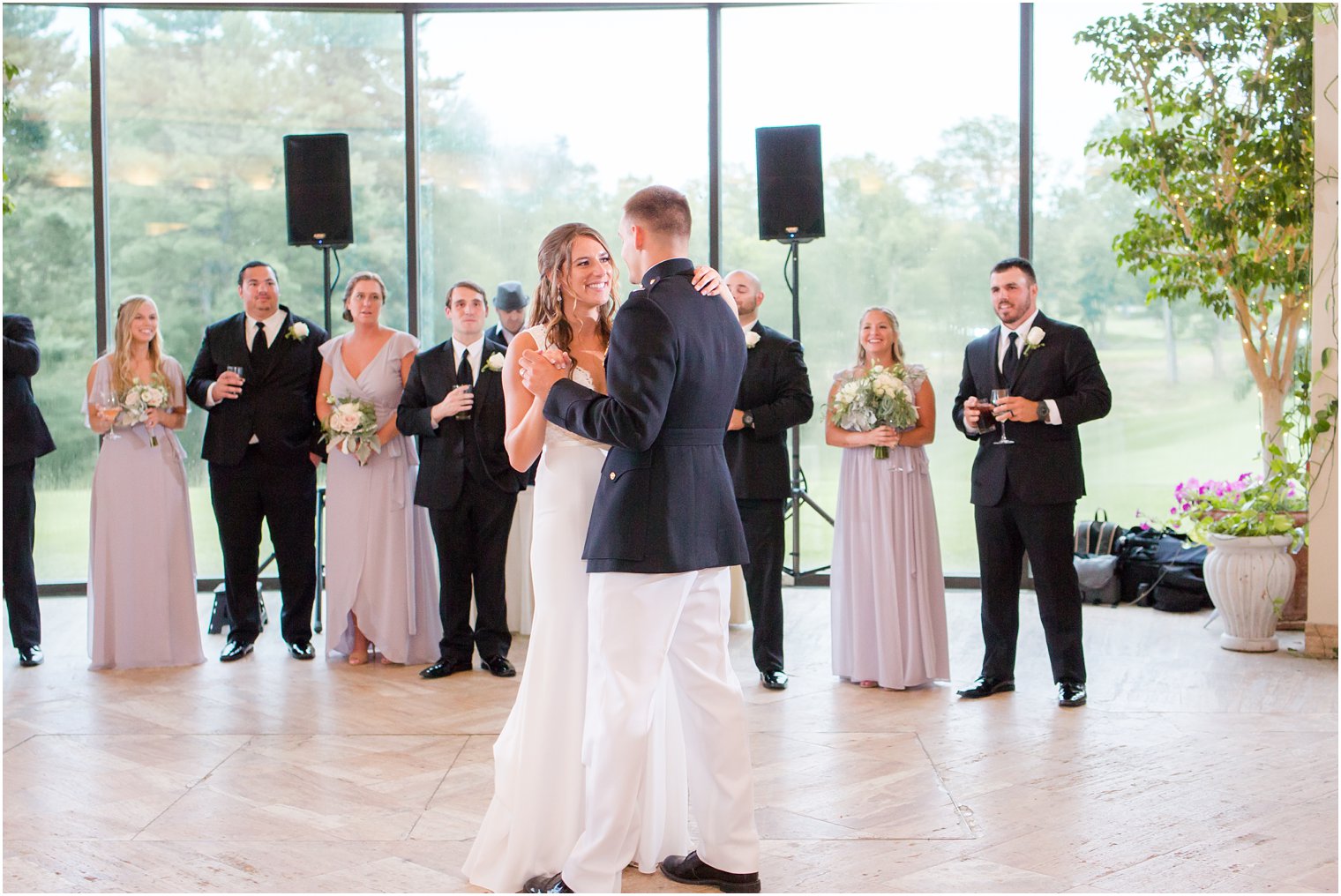 bride smiles at groom during first dance at Jasna Polana