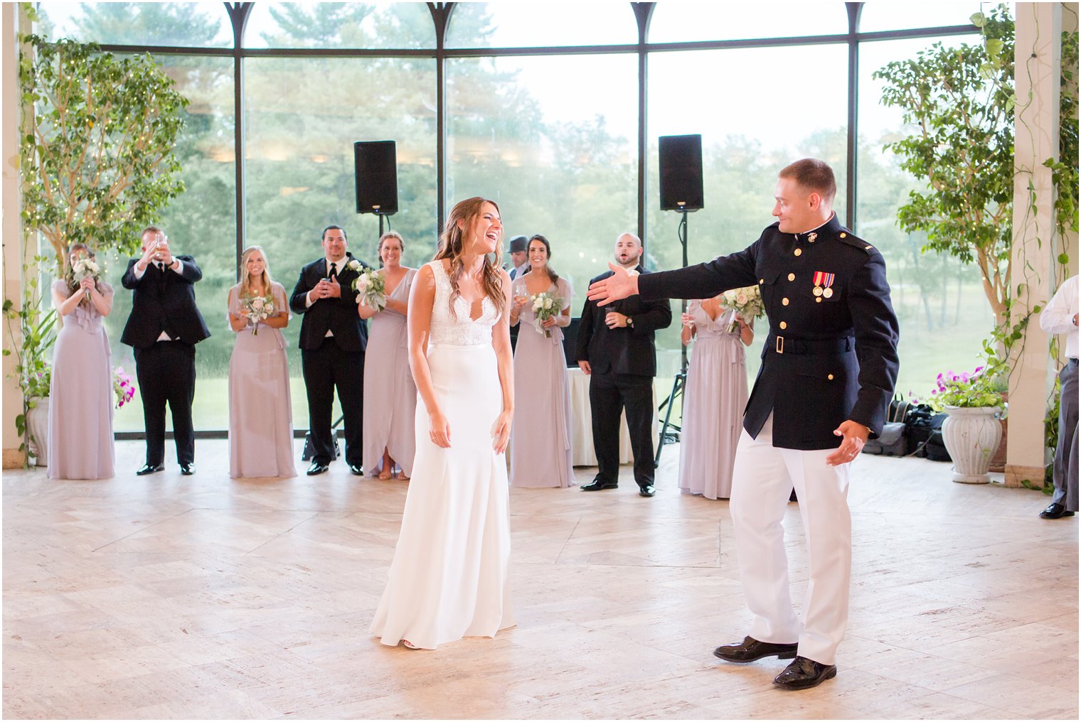 groom reaches for new wife at Jasna Polana wedding reception