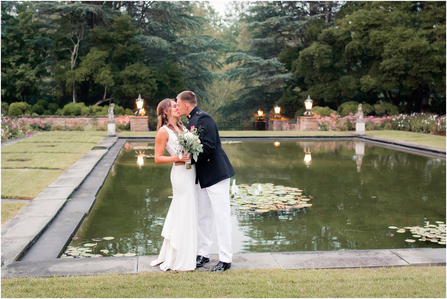 kiss at Jasna Polana gardens in NJ on wedding day