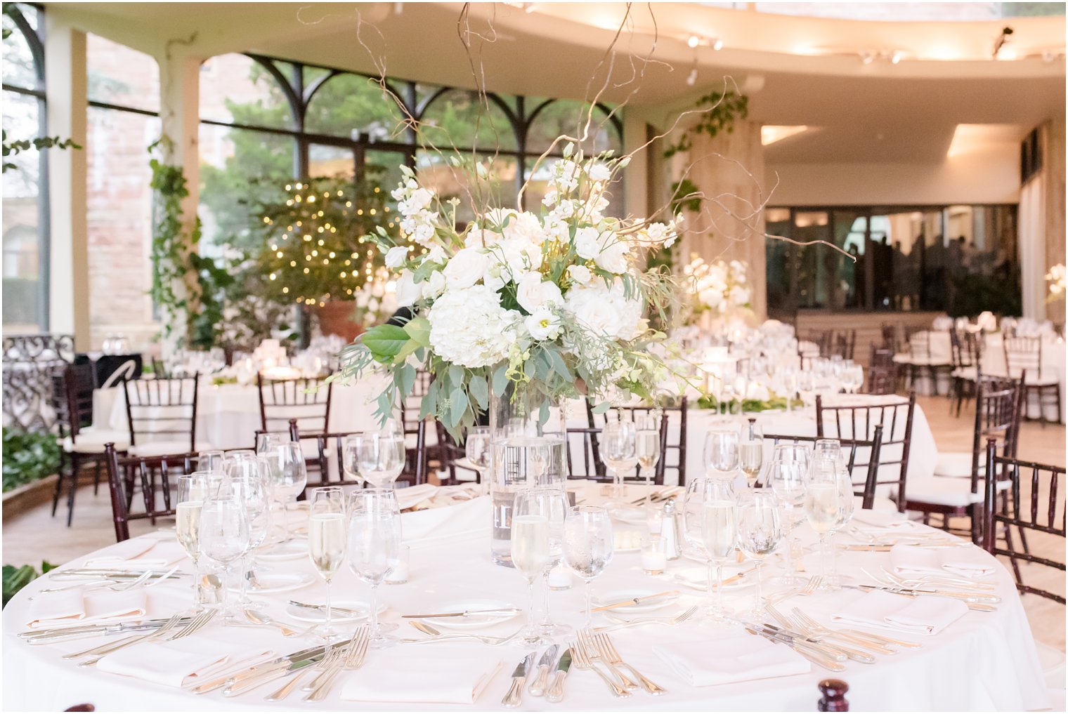 elegant white and green floral centerpieces by Meghan Pinsky photographed by Idalia Photography