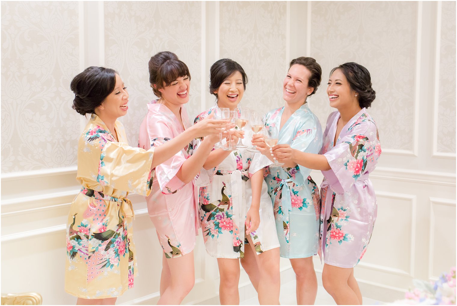 bride and bridesmaids cheering wedding day at The Bethwood