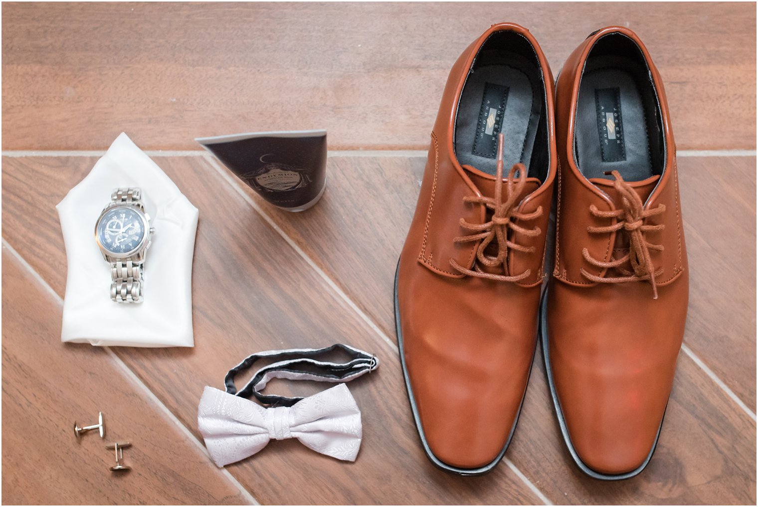 Groom's watch, tie, and shoes from Men's Wearhouse