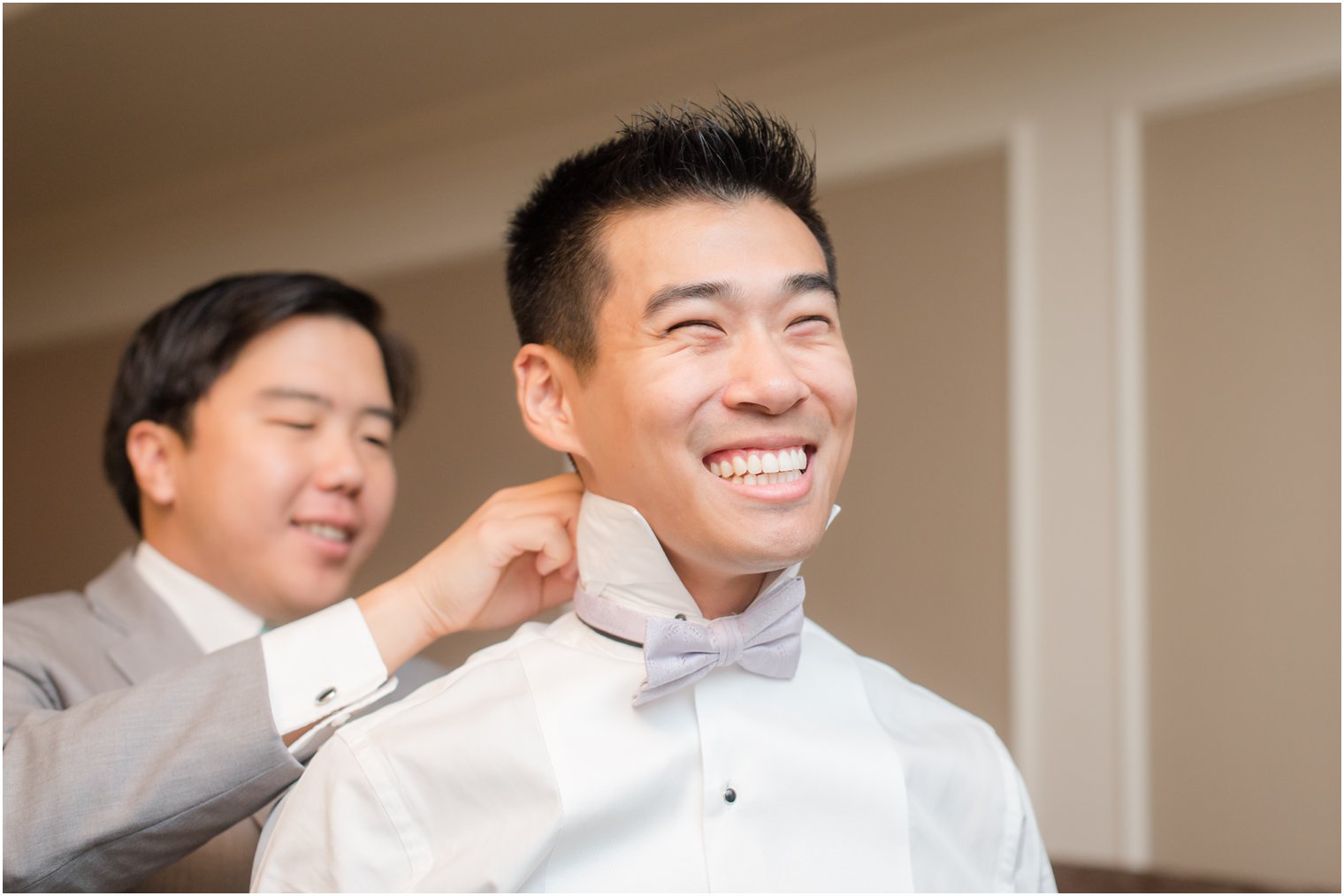 groom gets ready at The Bethwood with groomsman's help