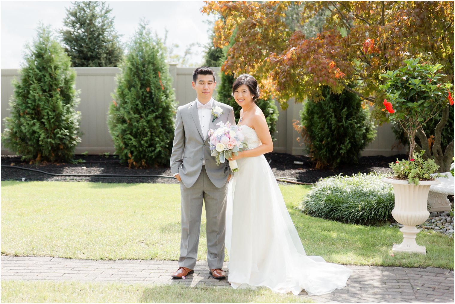 bride and groom in garden at The Bethwood photographed by Idalia Photography