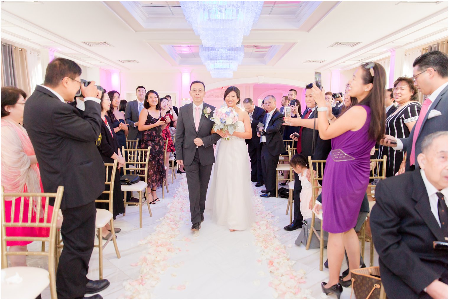 bride walks down the aisle at The Bethwood