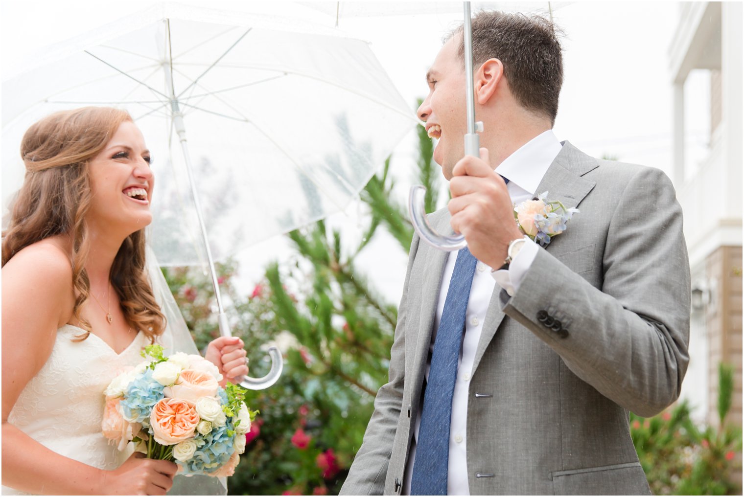 joyful first look on Brant Beach Yacht Club wedding day photographed by Idalia Photography