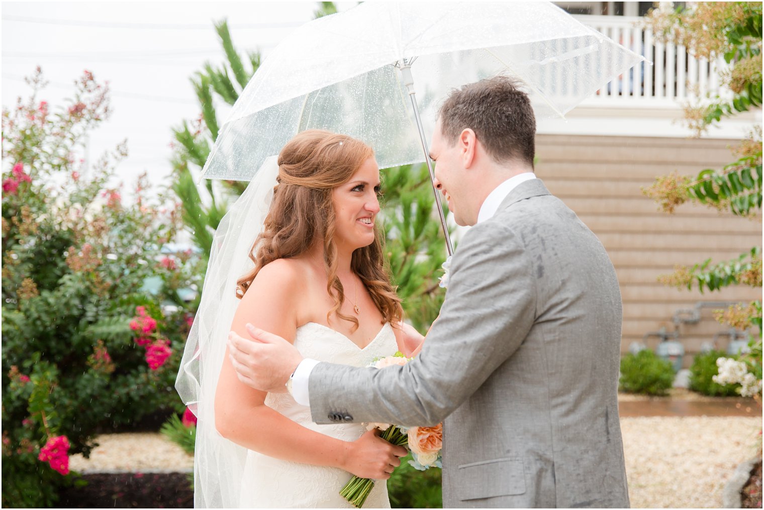 first look on Brant Beach Yacht Club wedding day photographed by Idalia Photography
