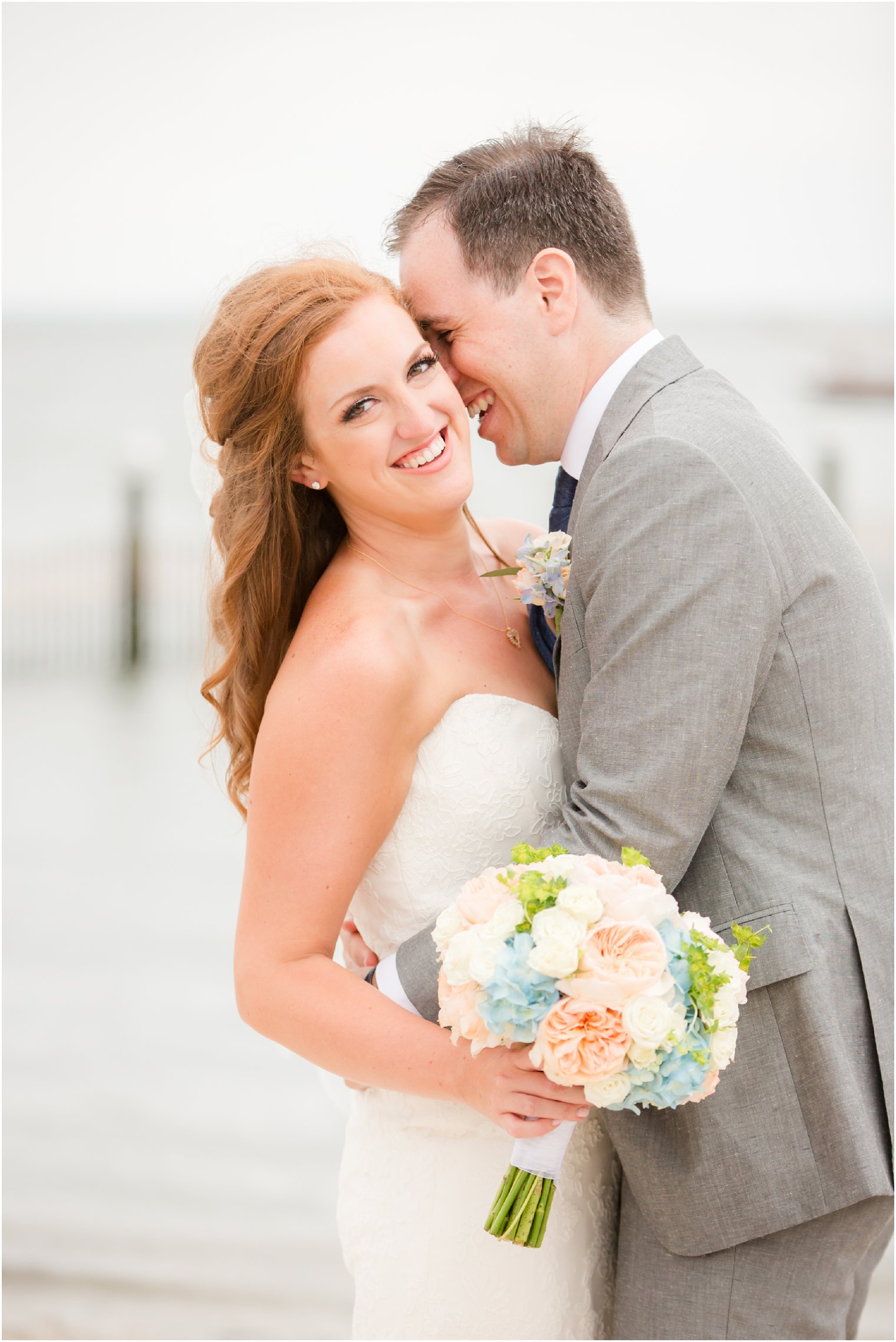 Brant Beach Yacht Club wedding portraits on oceanfront with Idalia Photography