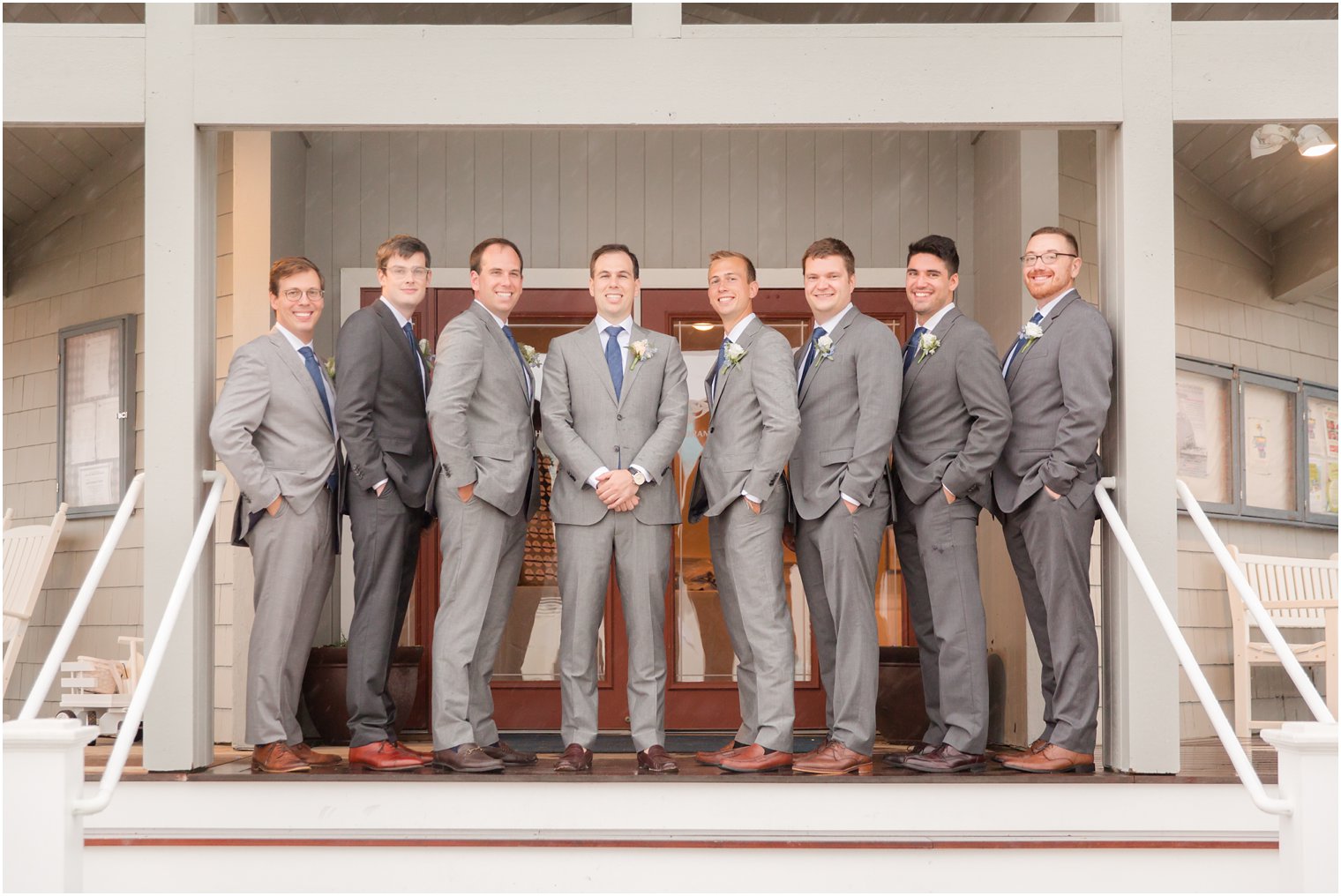 groom and groomsmen in grey suits from Suitsupply photographed by Idalia Photography