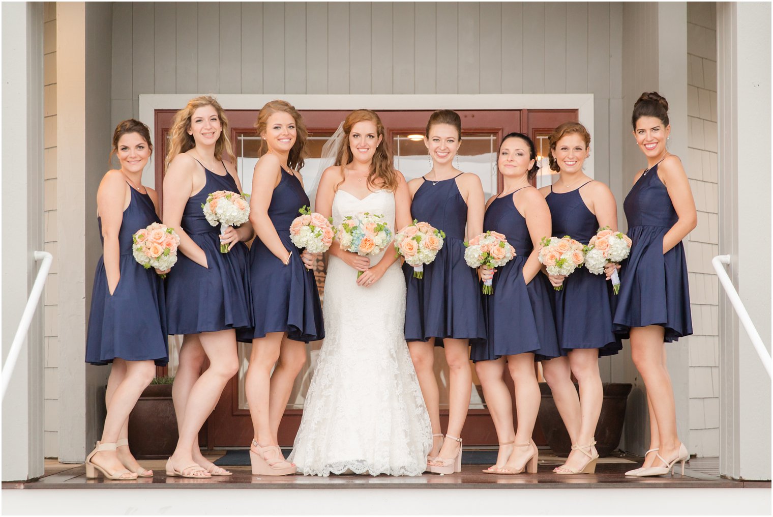 bride with bridesmaids in Weddington Way dresses photographed by Idalia Photography