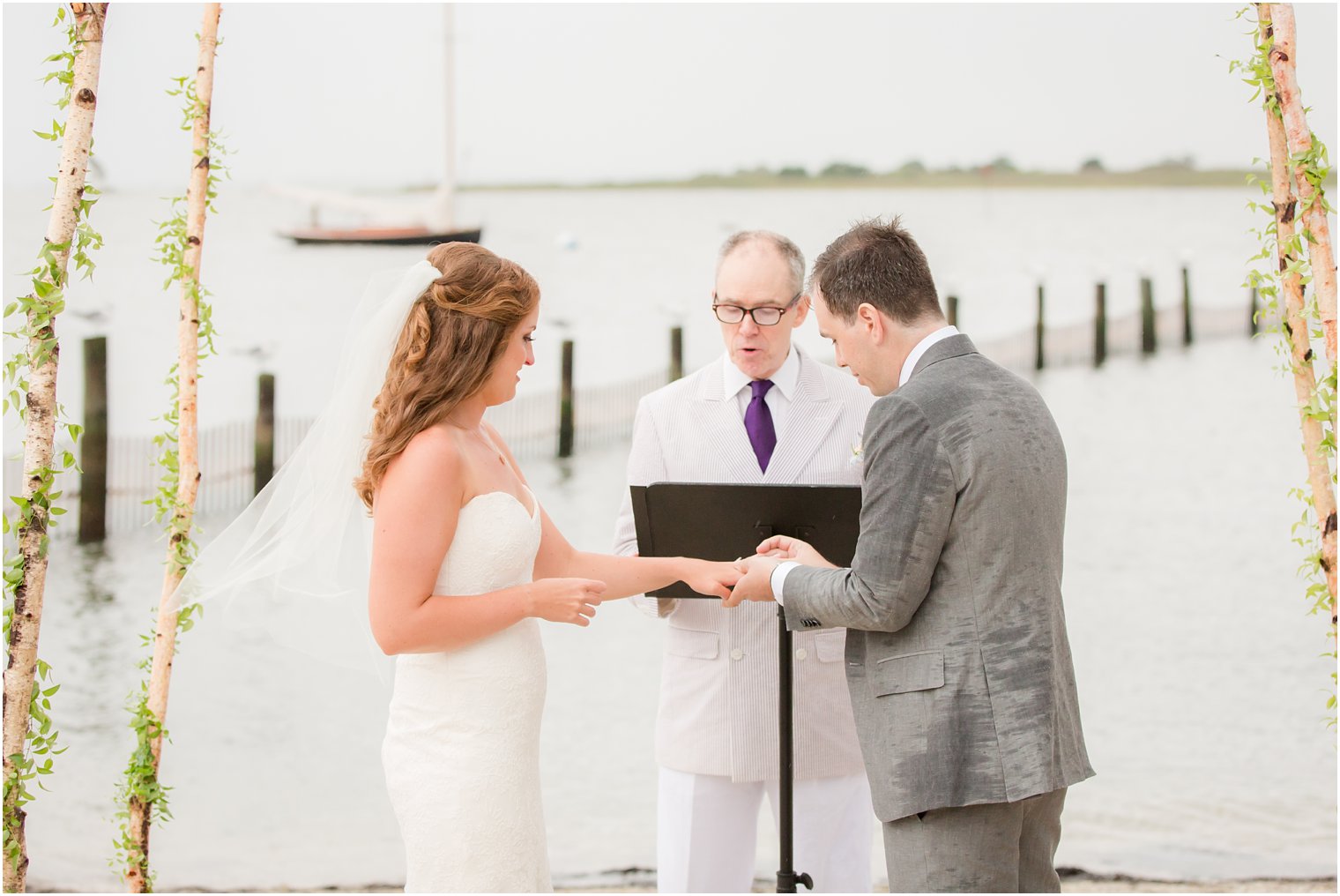 bride and groom exchange rings photographed by NJ wedding photographer Idalia Photography