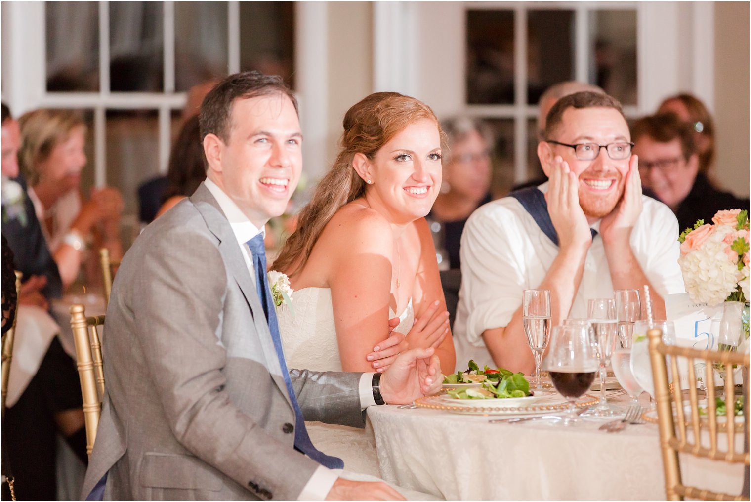 wedding toasts during Brant Beach Yacht Club reception photographed by NJ wedding photographer Idalia Photography