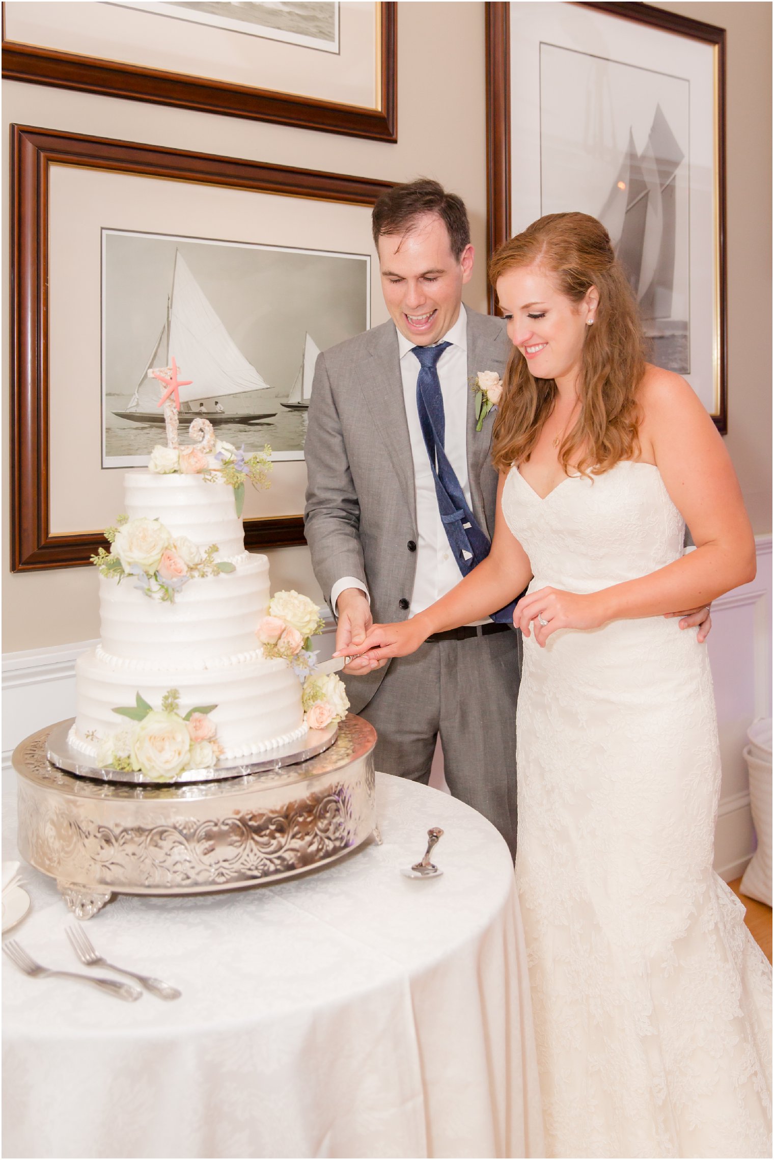 bride and groom cut wedding cake by A Sweet Memory photographed by Idalia Photography