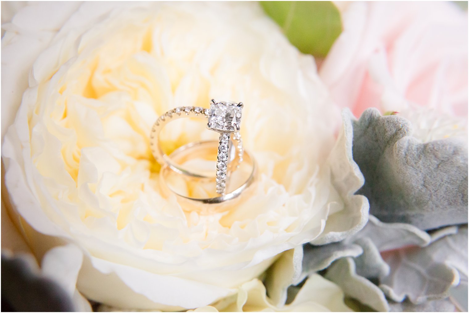 diamond ring on ivory peony photographed by NJ wedding photographer Idalia Photography