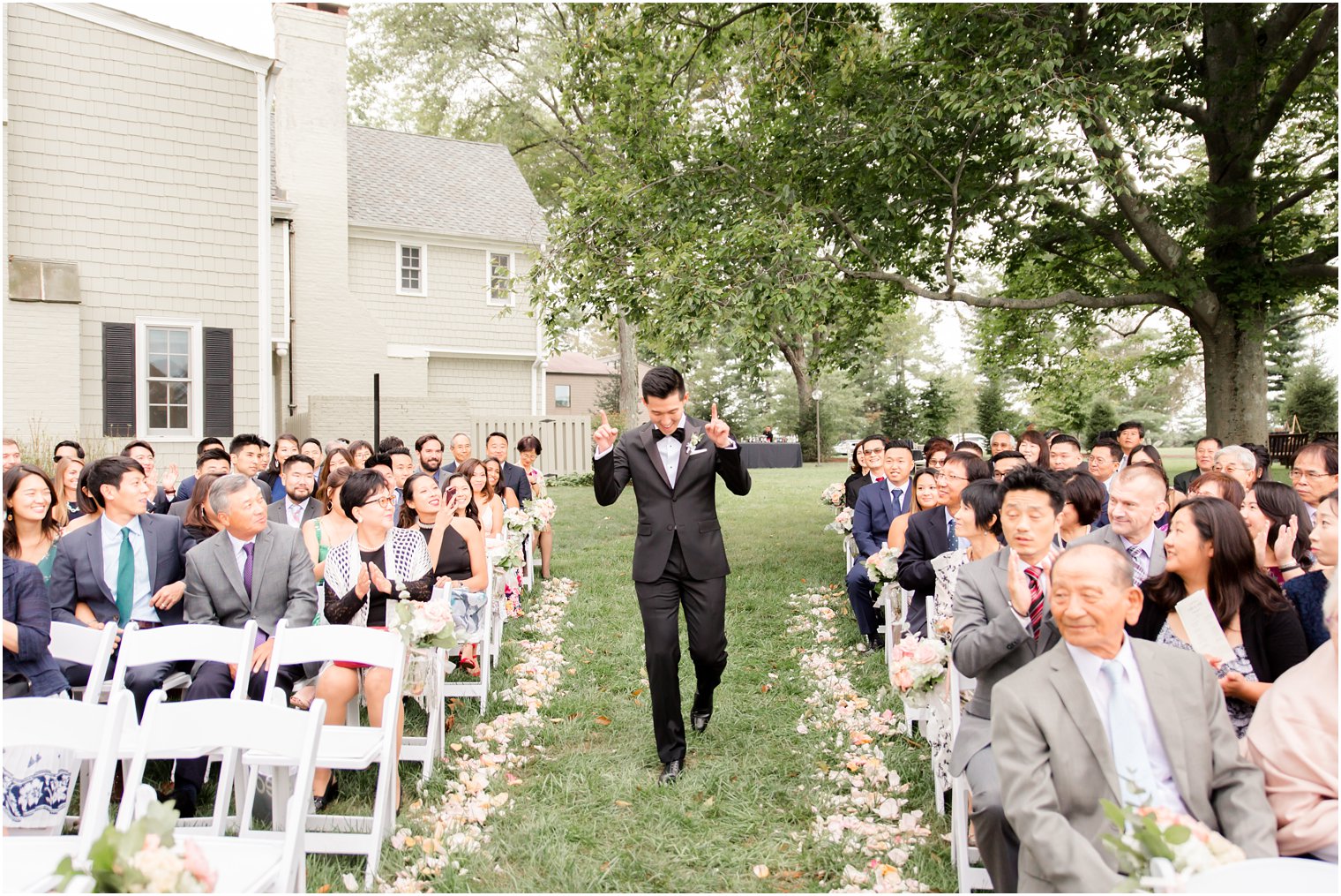 groom enters wedding day at Chauncey Hotel photographed by Idalia Photography