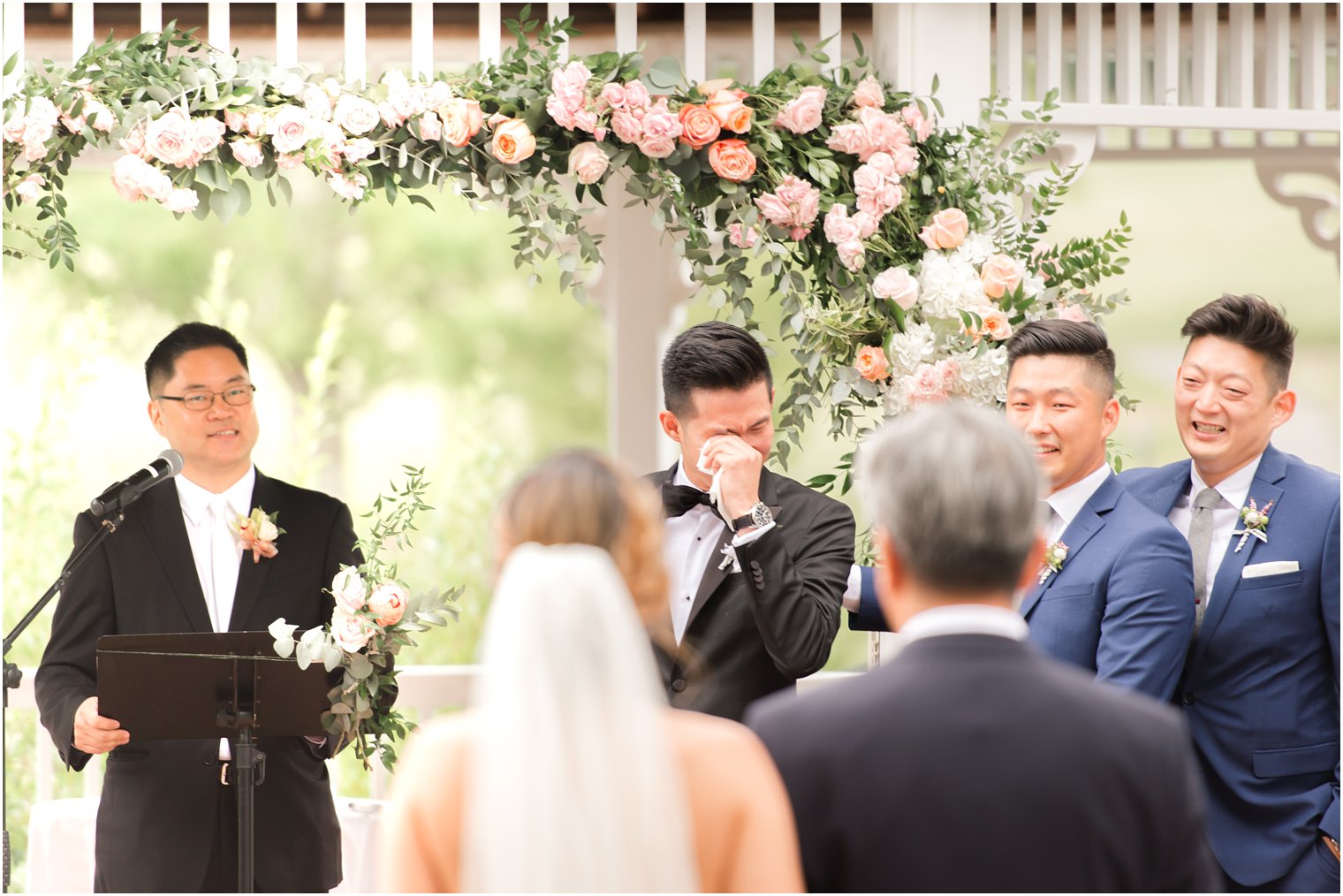 groom cries when seeing bride at Chauncey Hotel photographed by Idalia Photography