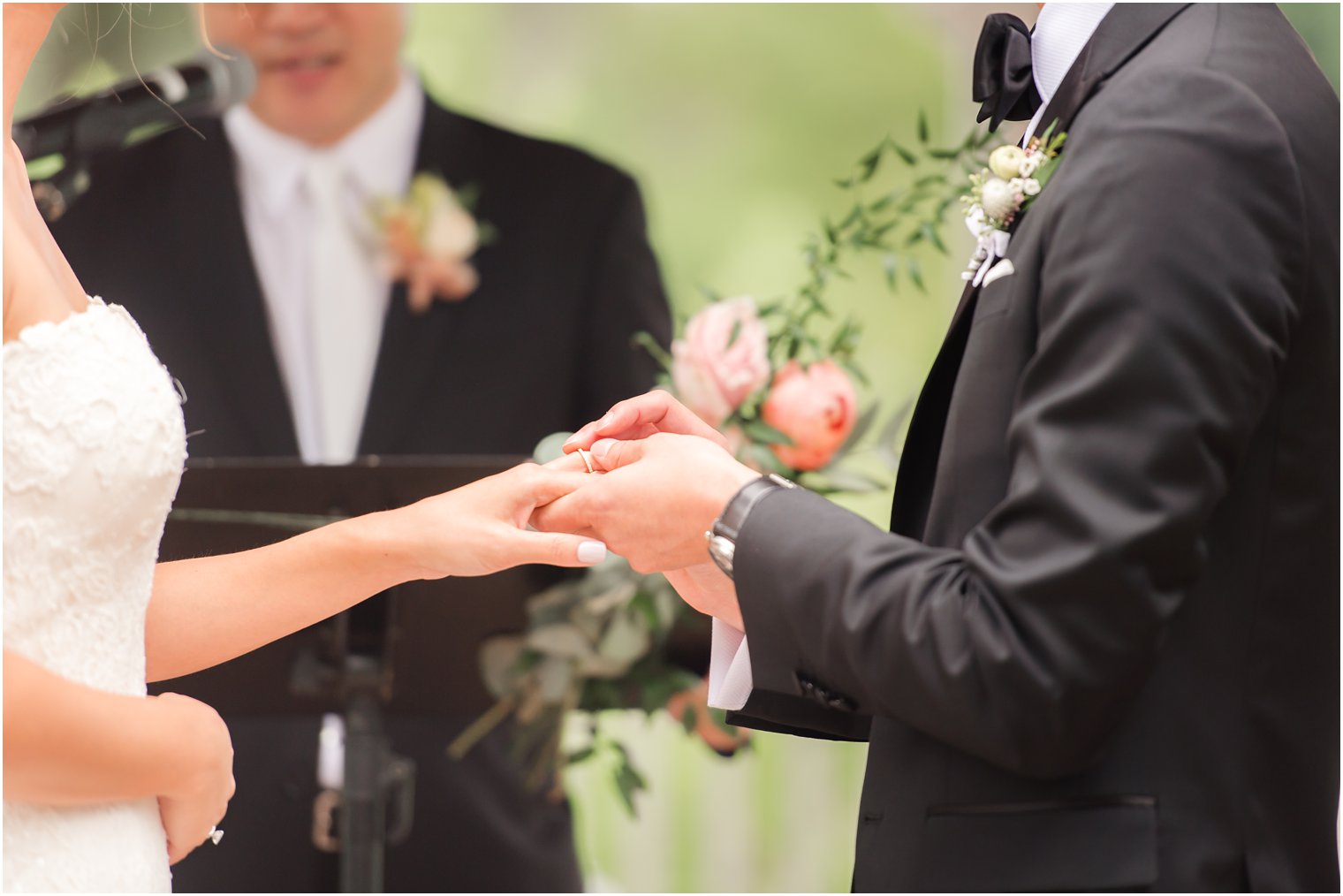 exchange of rings photographed by New Jersey wedding photographer Idalia Photography