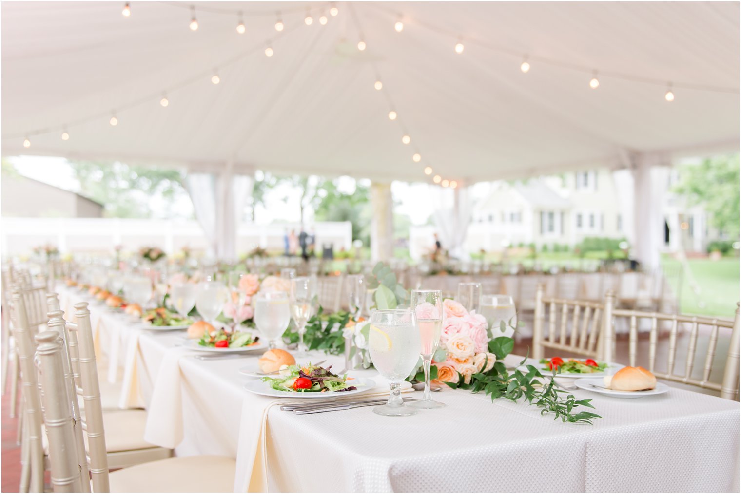 elegant tented wedding reception at Chauncey Hotel photographed by Idalia Photography