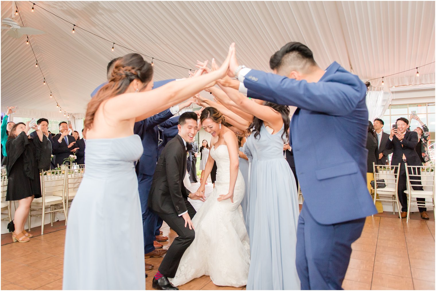 fun entrance to reception dance floor photographed by Idalia Photography