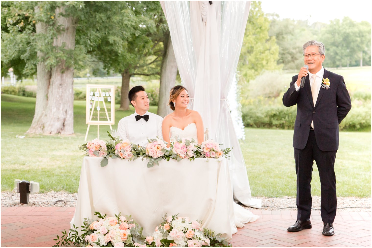 wedding toasts at Chauncey Hotel reception photographed by Idalia Photography