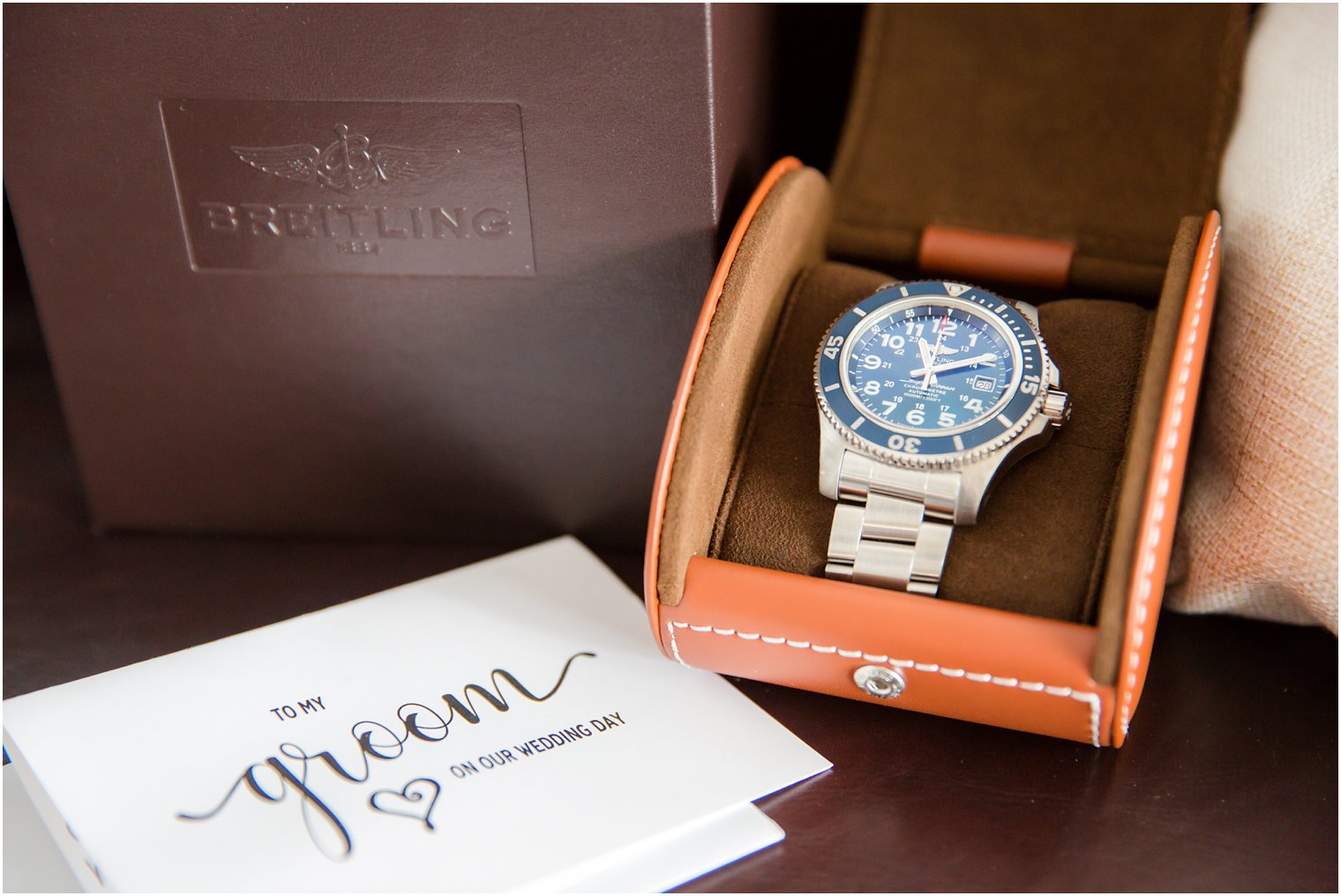 Breitling watch gift for groom on wedding day photographed by Lake Mohawk Country Club