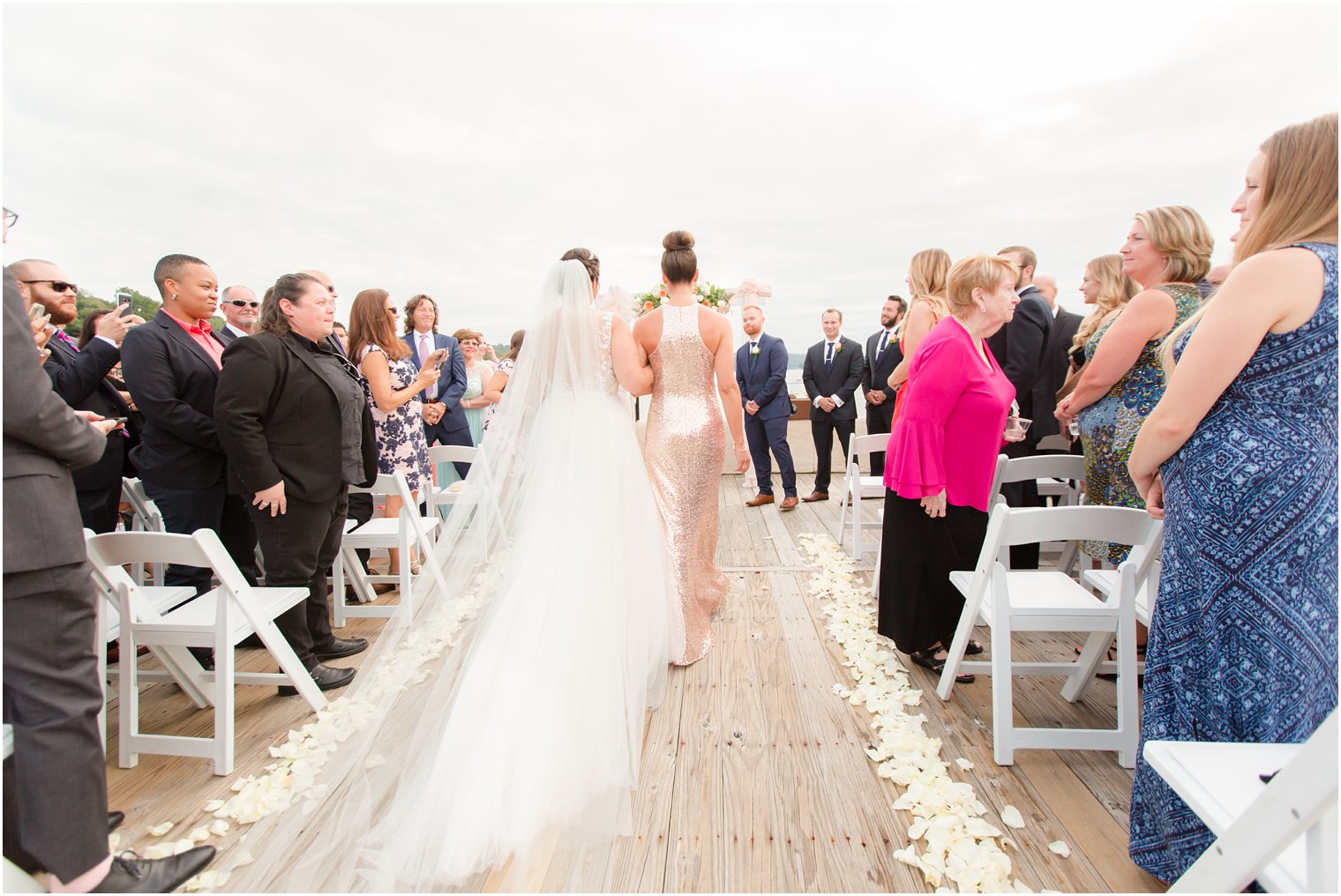 mother walks bride down the aisle at Lake Mohawk Country Club