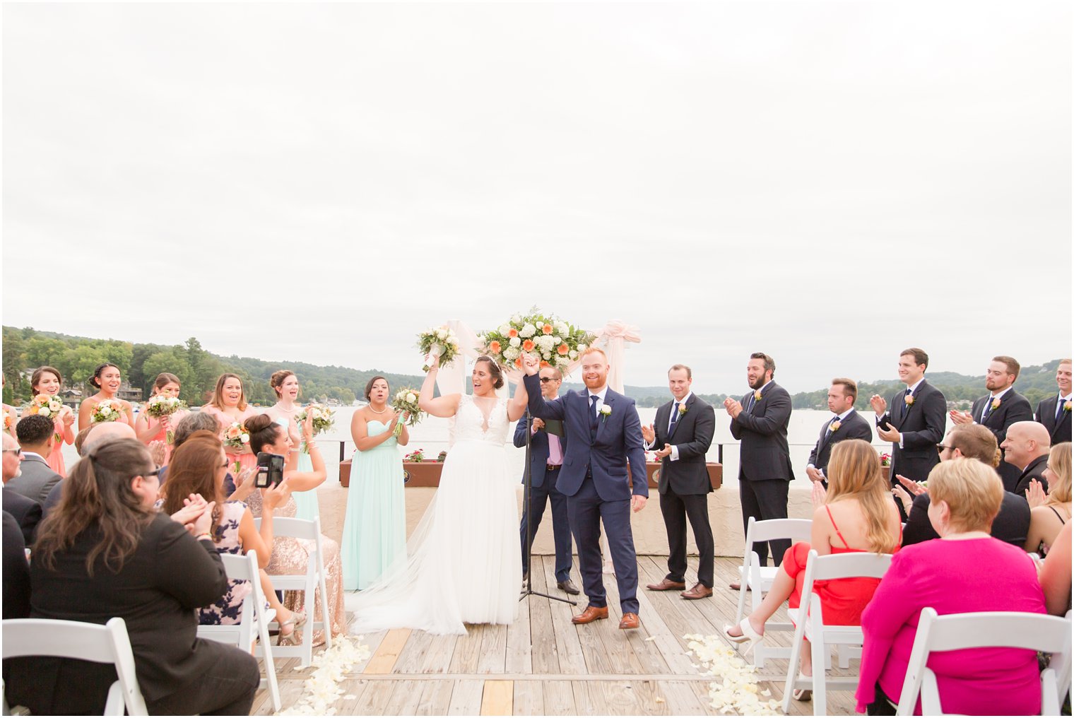 joyful newly married couple at Lake Mohawk Country Club photographed by Idalia Photography